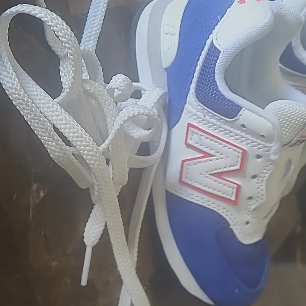 New Balance 574 Kids Sneakers in Blue and White with Pink Accents, Size 11C